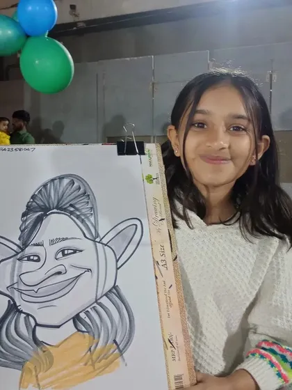 A guest at the Magarpatta birthday party. I love the challenge of drawing different faces and expressions.