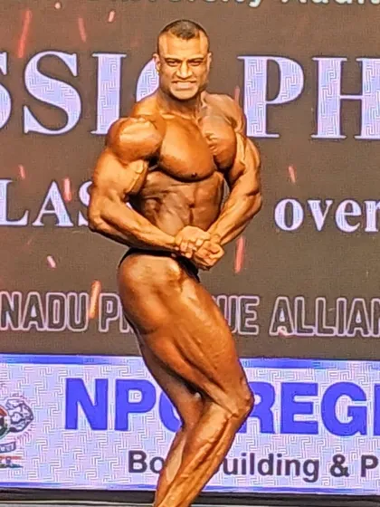 Another angle of the side chest pose from my NPC Nationals win. Consistency in every pose, from every angle, is what secures a championship title.