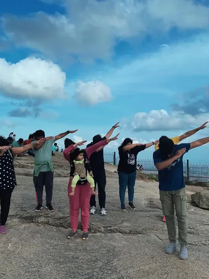 A fun "dab" pose by our group at Nandi Hills.
