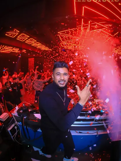 A repeat of the iconic confetti shot from Club Illusions, this time emphasizing my interaction with the camera and the crowd.