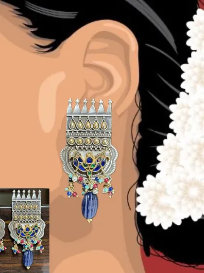 An illustration showing how my fusion earrings look when worn. This helps you visualize how the size and drop of these statement pieces complement your look, especially with a traditional hairstyle.