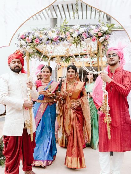 The bride's entry is always a magical moment. I loved creating this delicate 'phoolon ki chaadar' with a canopy of pastel flowers and hanging jasmine strings for her walk down the aisle.