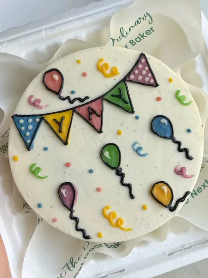 A mini cake for any celebration! This one features a colorful "YAY" banner with balloons and confetti, perfect for celebrating a small win or achievement.