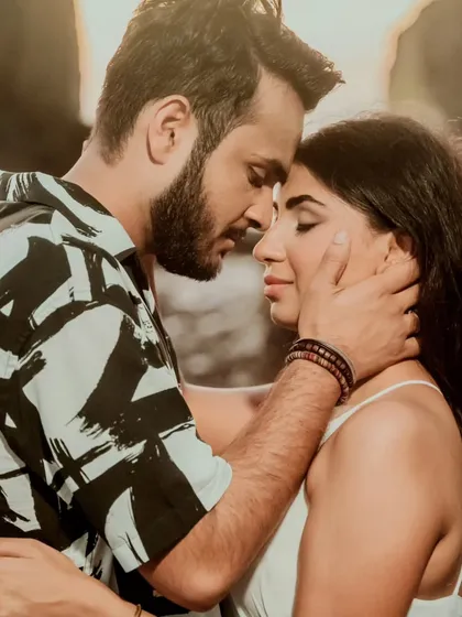 A beautiful, emotional close-up of a couple during their pre-wedding shoot in Goa. The soft lighting and genuine expressions make this a truly intimate portrait.