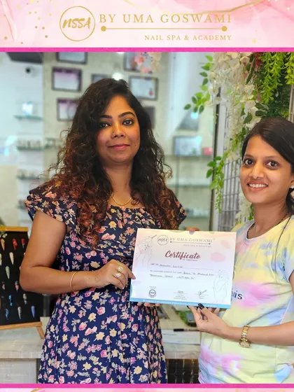 Another proud graduate, Ashwini, with her certificate. Her journey from Dombivli to our academy has been a successful one.