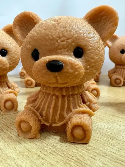 Adorable teddy bear soaps made with shea butter and sweet orange essential oil, perfect for making bath time fun.