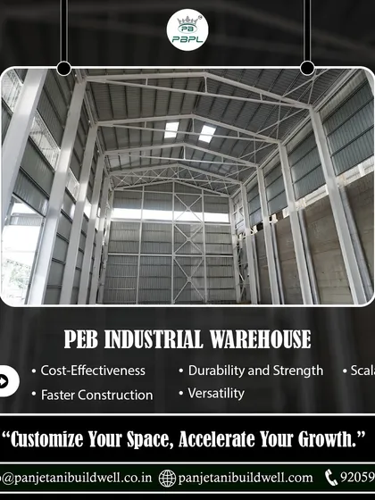 Customize your space and accelerate your growth with a PEB industrial warehouse. The interior view highlights the immense vertical space and structural strength, offering benefits like scalability and faster construction.