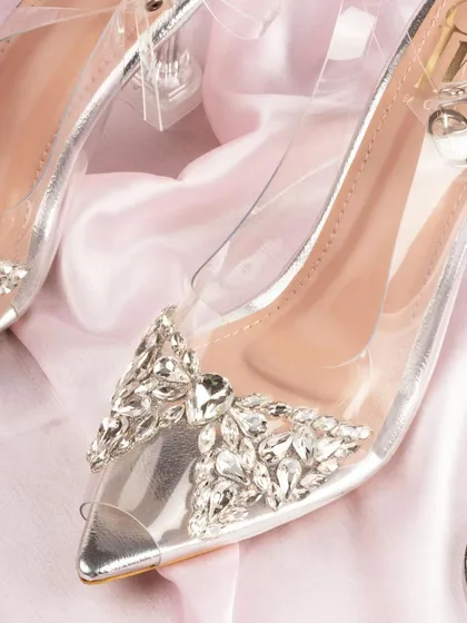 A detailed macro shot of the crystal embellishments on a pair of Fancy Nancy heels. This close-up highlights the craftsmanship and luxurious details of the footwear.