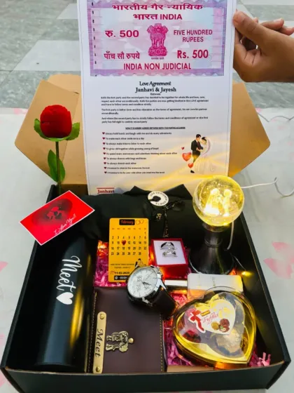 For a gift that's both romantic and fun, I created this "Love Agreement" hamper. It's a quirky and memorable way to celebrate an anniversary or Valentine's Day, bundled with a watch, personalized bottle, and other romantic treats.