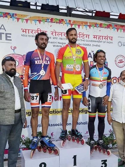 Receiving my two gold medals at the RSFI National Championship. I was also awarded for my performance, a recognition of the hard work put in.