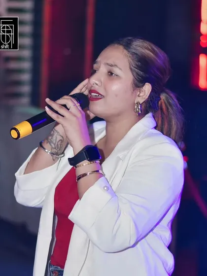 This guest is delivering a powerful performance at one of our weekly karaoke nights. I love seeing people discover their inner performer.