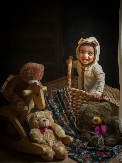 A first birthday is a huge milestone. This studio setup with teddy bears and a vintage feel is a perfect way to celebrate one whole year of joy with your little one.