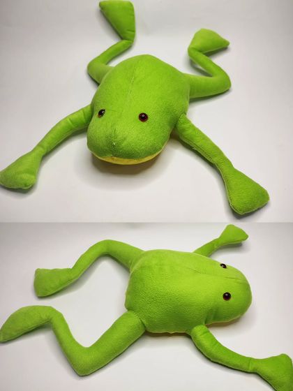 A quirky and fun handmade frog soft toy, another creation from our toy-making workshop.