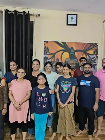 Our yoga community gathered after a meditation session. Practicing together amplifies the sense of peace and shared purpose.