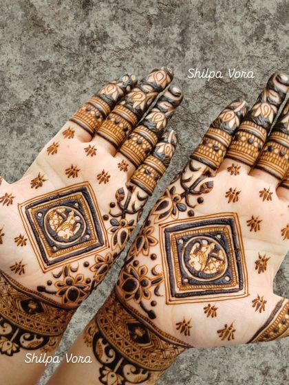 A design featuring Ganesha in a square frame, a popular choice for auspicious beginnings and celebrations.