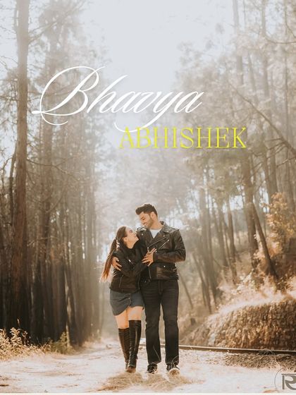 A full-length portrait of the couple on a path through the woods, their names elegantly written above, creating a personalized and romantic save-the-date image.