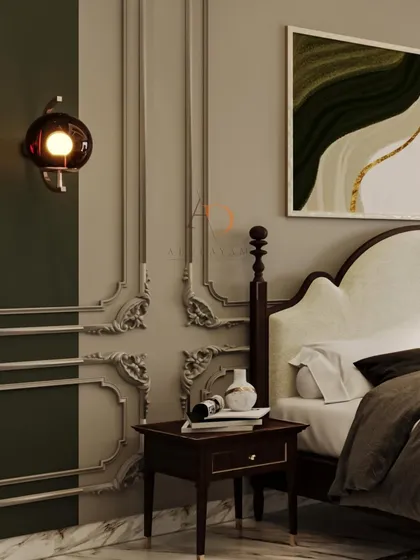 The difference between good and great design lies in the details. This close-up shows the ornate, neo-classical wall paneling and a vintage-style sconce that I used to add a layer of timeless elegance and character to a modern bedroom. Craftsmanship is at the core of my work.