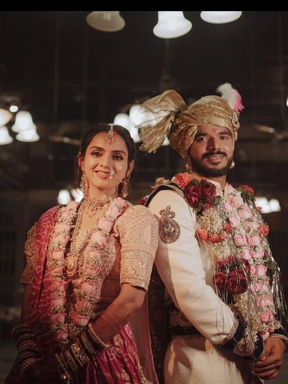 The happy couple. The bride's soft and dreamy look is perfect for a modern Gujarati wedding, focusing on natural beauty.