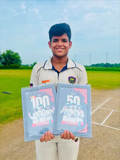 A close-up of Harshit with his awards. His passion for the game is evident.