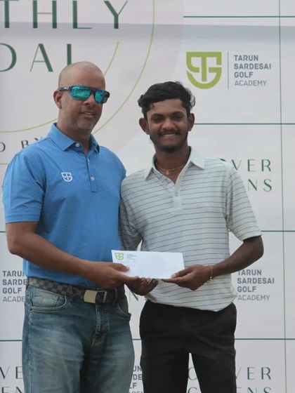 Presenting an award at the Monthly Medal. These events push young golfers to elevate their game under pressure.