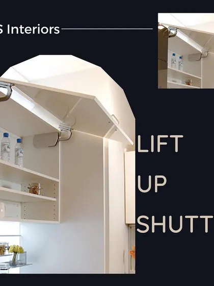 This image shows a hydraulic lift-up shutter. This premium hardware allows large cabinet doors to open upwards with minimal effort and stay securely in place, perfect for wide cabinets over the counter.