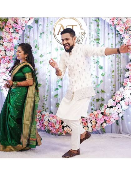 A candid shot of the groom dancing with joy at his Sangeet, a moment of pure celebration.