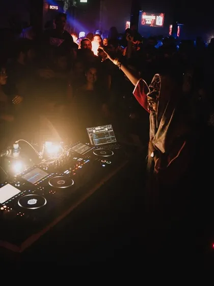 A powerful moment from my London set, with the lights focused on the decks. In this moment, it's just me and the music, ready to take the crowd on a journey.