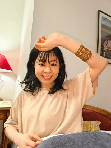 A playful pose from my client, showing off her new Indian henna tattoo.