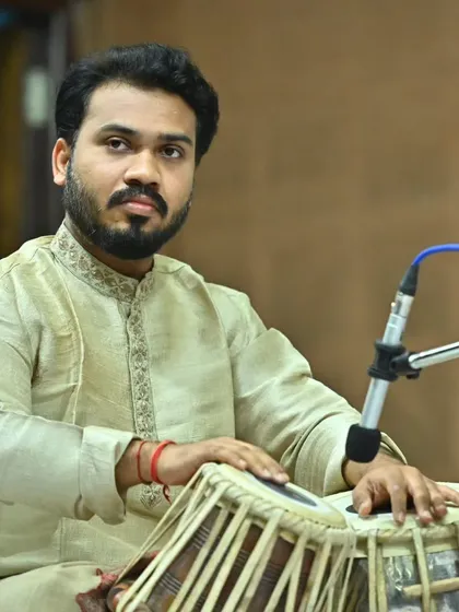 Pictures from the Komal Nishad concert, providing tabla accompaniment for Pandit Debashish Bhattacharya ji on the slide guitar.