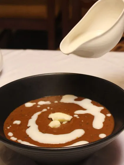 Our Dal Makhani is pure comfort in a bowl. Slow-cooked lentils with butter and cream create a dish that is rich, creamy, and deeply flavorful.