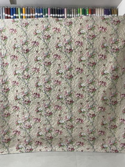 The floral backing fabric of the Chandelier quilt.