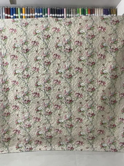 The floral backing fabric of the Chandelier quilt.
