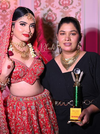 Our class winner! This student created an exceptional bridal look and earned the winner's trophy for her hard work and skill.