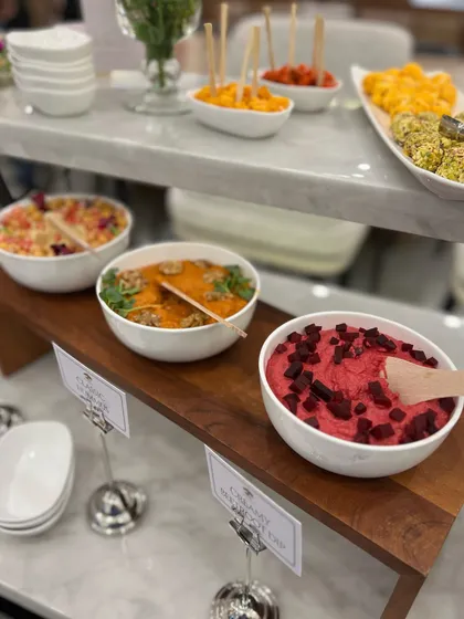 A colourful array of our house-made dips, including beetroot hummus and a spicy tomato dip. Fresh, vibrant food is our signature.