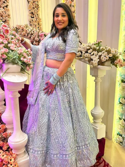More pictures of my client enjoying her event in the powder blue lehenga. It's so rewarding to see my outfits become a part of someone's happy memories.