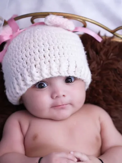 A cute close-up of an awake baby with big, curious eyes. These moments of connection are just as precious as the sleepy ones.