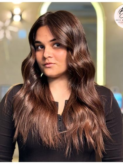 Another angle highlighting the depth and sparkle of this rich brown hair transformation.