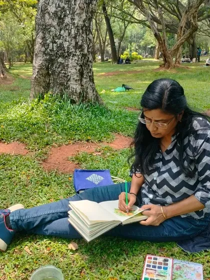 Sketching in my book at Cubbon Park. I'm always collecting ideas and inspiration from the world around me.