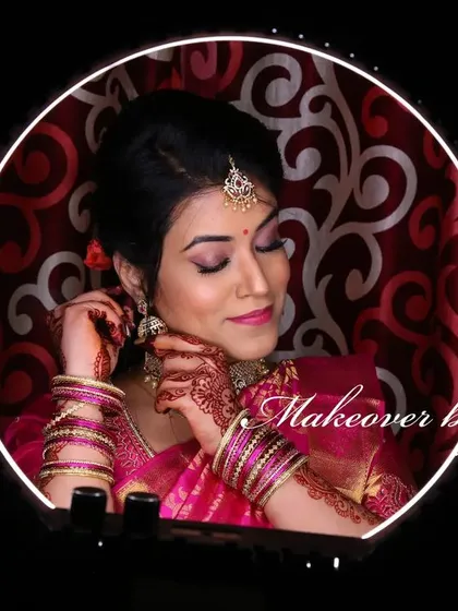 A complete look at Nirosha's engagement style. She wore a vibrant silk saree, and we created a soft glam look with a pretty pink lip and a chic updo.