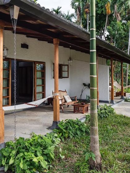 The private veranda of a Garden Suite room, showing how the living space extends into the landscape.