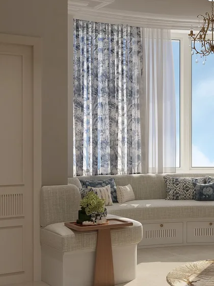A large bay window floods the tea room with light, with a built-in window seat offering the perfect perch to enjoy a cup of tea and the view.