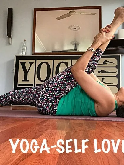 A reclining hand-to-big-toe pose, Supta Padangusthasana. This is a safe and effective way to stretch the hamstrings while supporting the back.