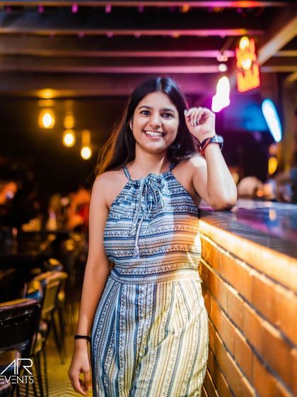 A guest posing at the bar.