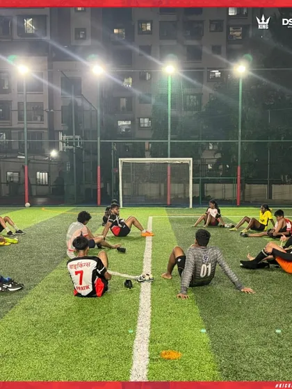 Rest and recovery are just as important as the grind. The team takes a moment to recharge before the next drill.