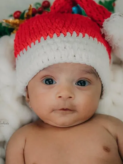 Another adorable close-up of this little one, ready for his first Christmas.