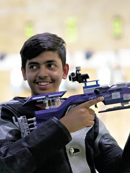 The smile of a shooter who has just discovered their focus and potential. We provide all the professional equipment, including Walther and Anschutz air rifles, so kids can experience the sport with the best gear from day one.