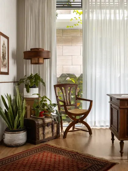 The study was designed as a quiet retreat, with classic furniture and rich wood finishes. It’s a space that feels connected to the outdoors and is designed to evolve with the client's growing collection.