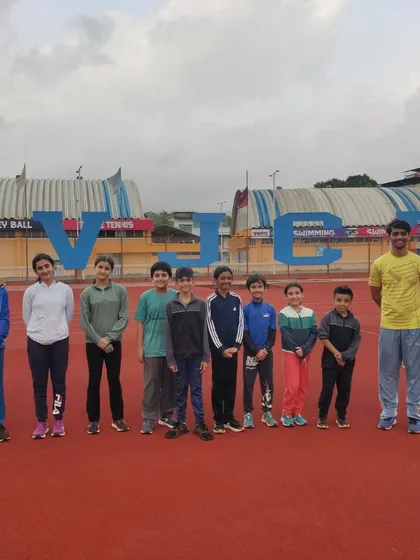 Our team stands proud at the world-class SVJCT Sports Academy facility in Chiplun. Our intensive off-site camps are designed to build a strong, united team away from distractions, fostering discipline and a shared drive for success.