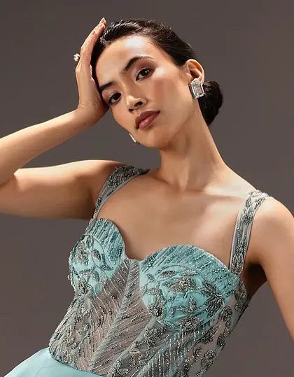 A close-up of the soft glam makeup and elegant updo. This look is a client favorite for its ability to look polished and beautiful without being overpowering.