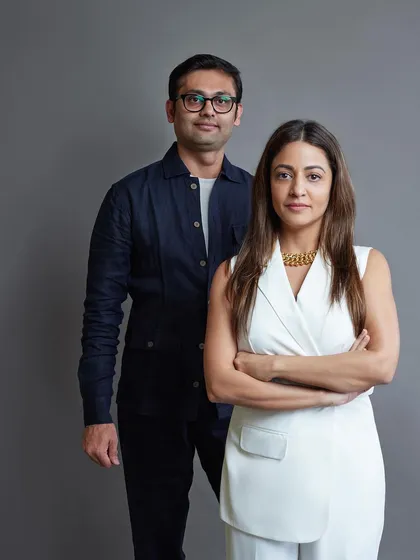 A professional portrait of us, Farah and Dhaval, the co-founders of FADD Studio.
